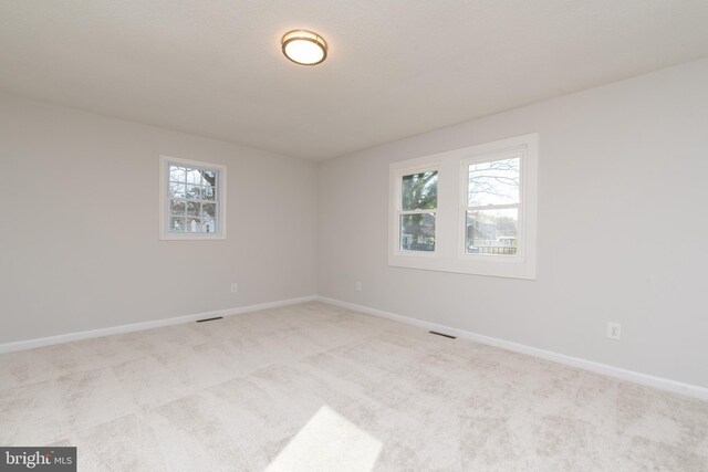 117 N Virginia Ave, Richmond, VA 23223 - unfurnished room featuring carpet floors and baseboards