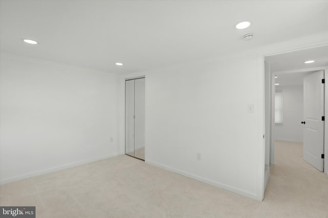 carpeted empty room with ornamental molding