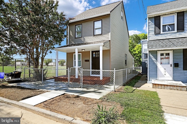 view of front of property featuring covered porch