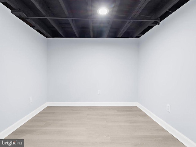 basement featuring light hardwood / wood-style floors