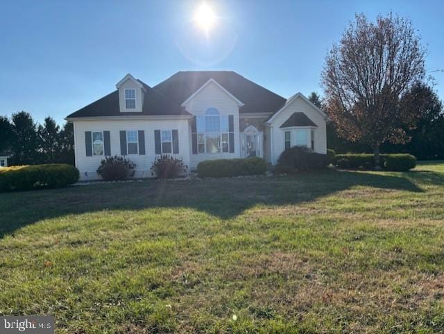 view of front of home with a front yard