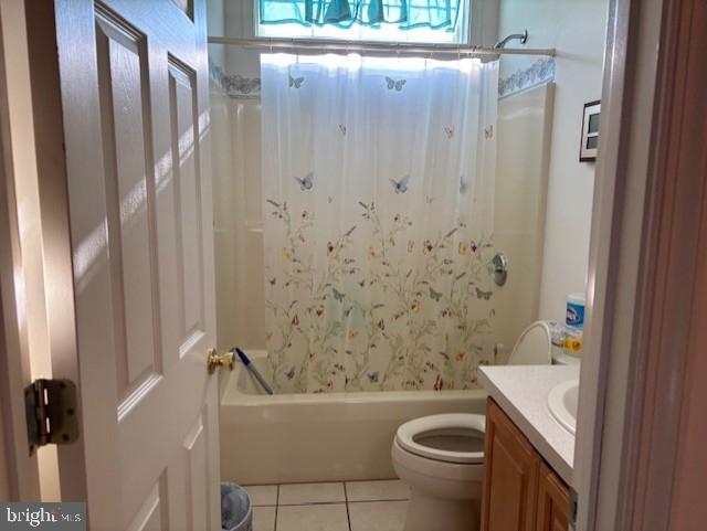 full bathroom with tile patterned floors, vanity, toilet, and bathtub / shower combination