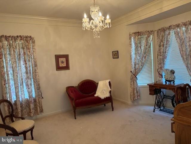 sitting room with light carpet, plenty of natural light, ornamental molding, and a notable chandelier