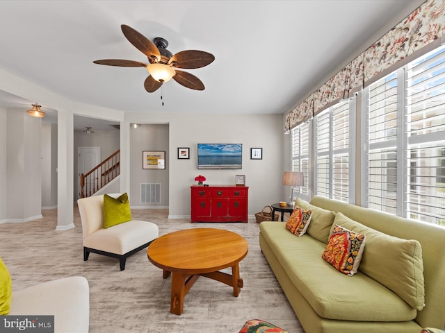 living room with ceiling fan