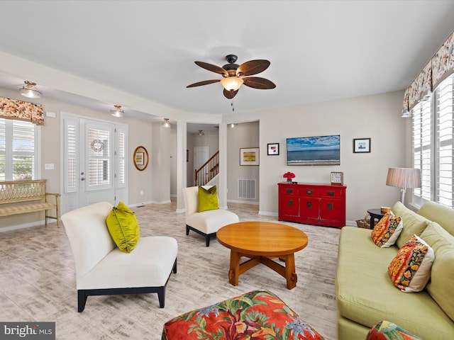 living room featuring ceiling fan