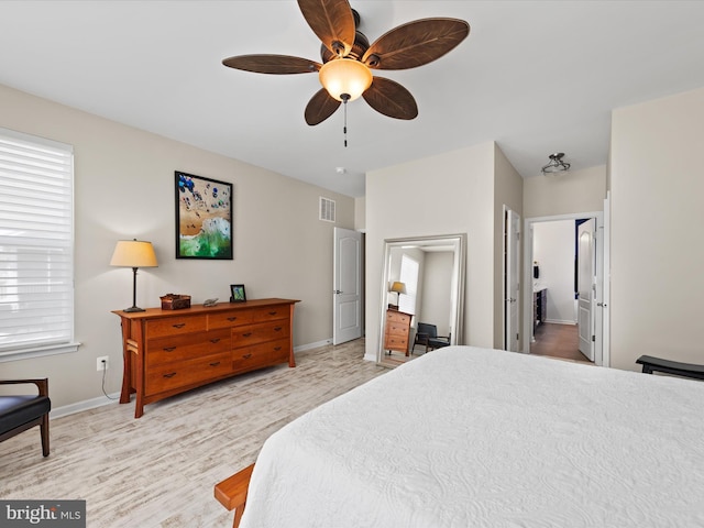 bedroom featuring ceiling fan and light hardwood / wood-style flooring