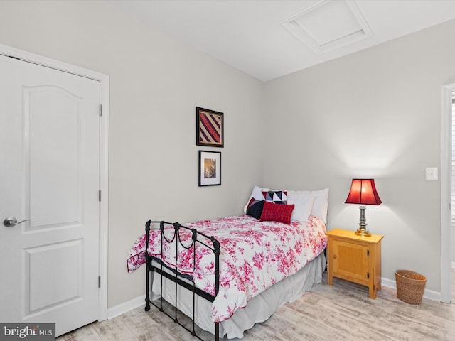 bedroom with light hardwood / wood-style flooring