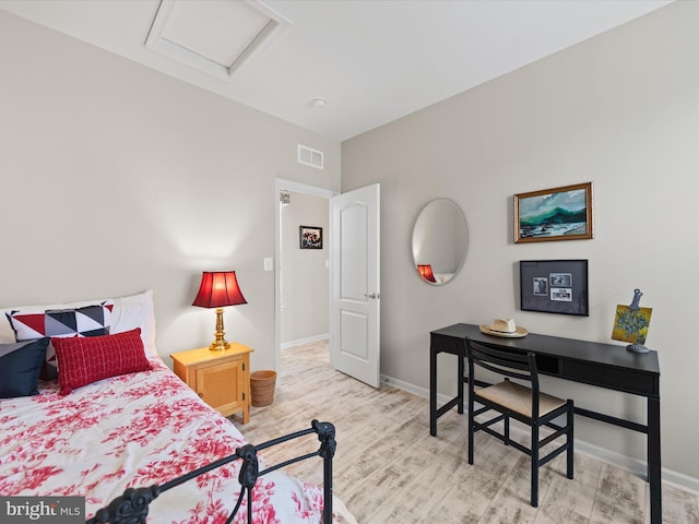 bedroom with light hardwood / wood-style floors