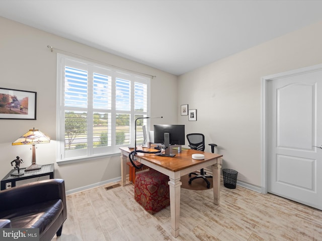 office space featuring light hardwood / wood-style floors