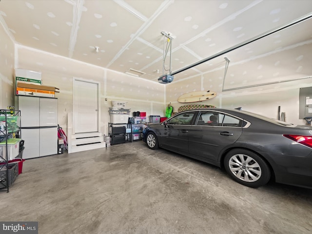 garage featuring a garage door opener