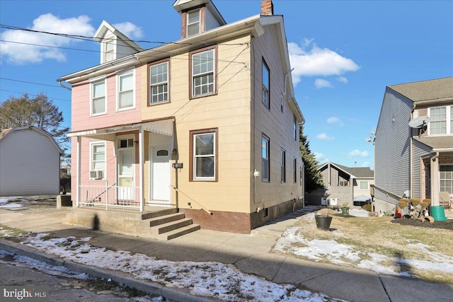 view of front of property with cooling unit