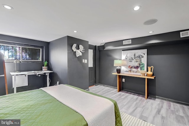 bedroom featuring light wood-type flooring