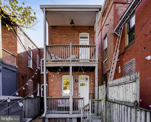 exterior space with a balcony and a porch