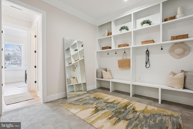 mudroom featuring crown molding