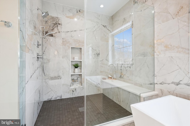 bathroom featuring tile walls and shower with separate bathtub