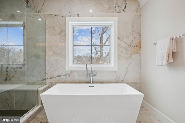 bathroom with a tub