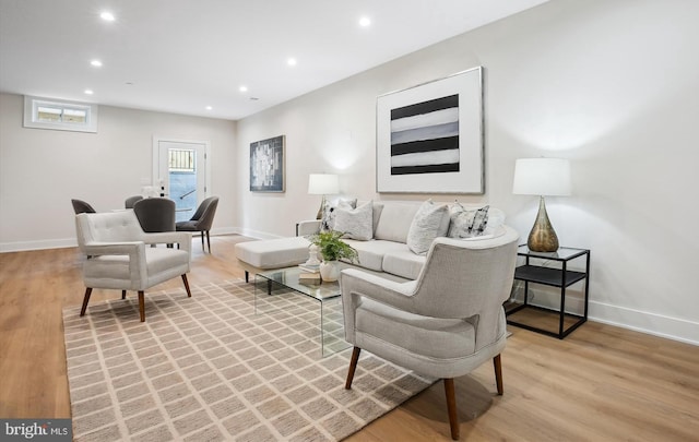 living room with light hardwood / wood-style floors