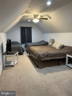 bedroom featuring ceiling fan, light colored carpet, and lofted ceiling