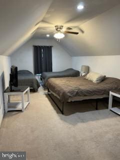 bedroom featuring carpet flooring, ceiling fan, and vaulted ceiling