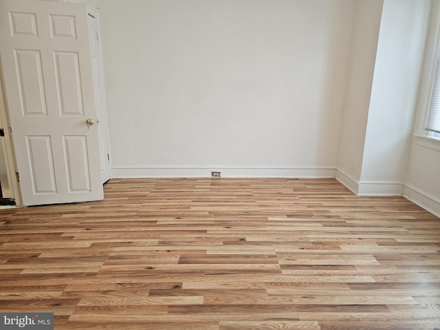 unfurnished room featuring light hardwood / wood-style floors