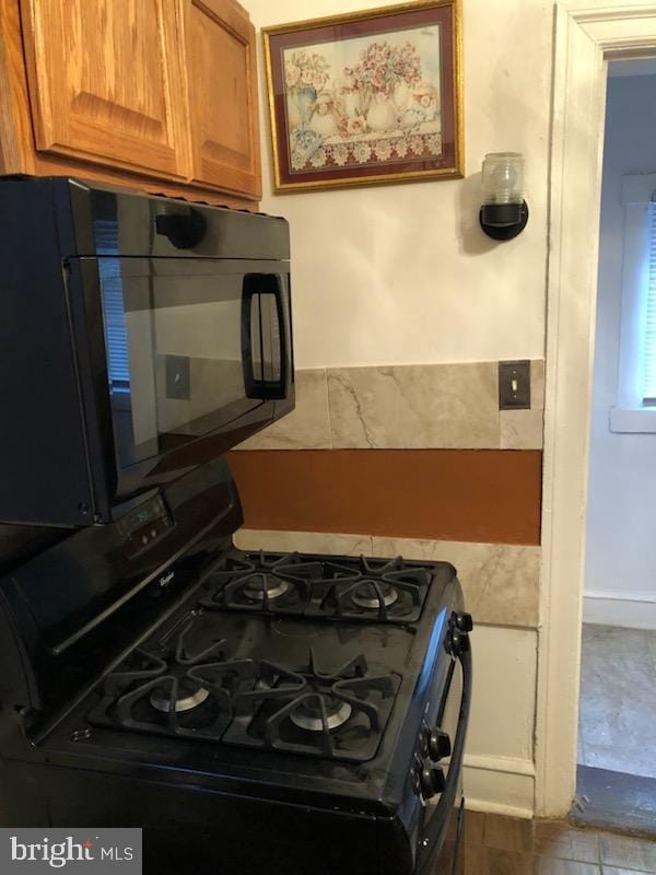 kitchen featuring black appliances