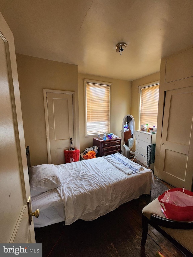 bedroom featuring hardwood / wood-style floors