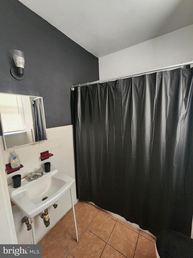 bathroom featuring tile patterned flooring and sink