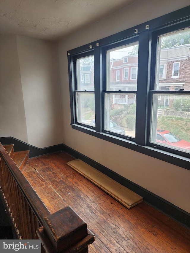 empty room featuring hardwood / wood-style flooring