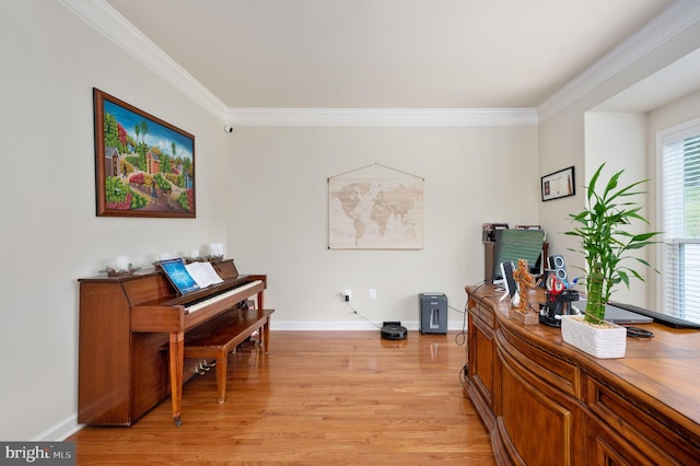 miscellaneous room featuring light hardwood / wood-style floors and crown molding