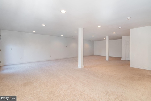 basement with light colored carpet