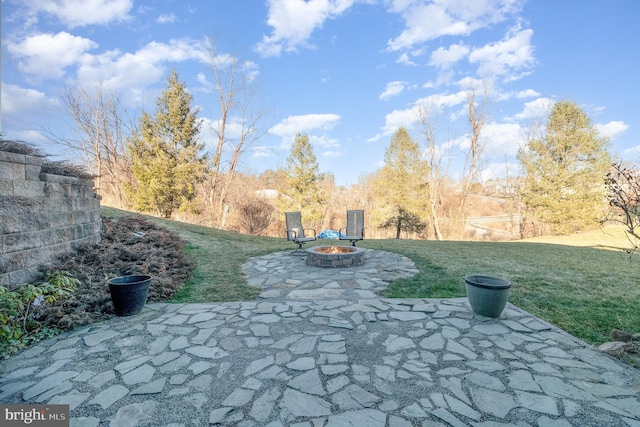 view of patio / terrace with a fire pit