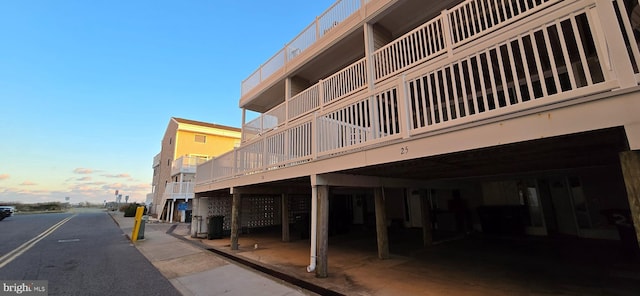 view of outdoor building at dusk