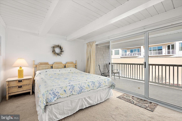 carpeted bedroom featuring beam ceiling, access to exterior, and wood ceiling