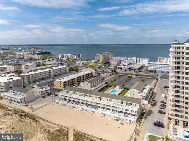 birds eye view of property featuring a water view