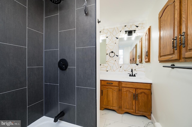 bathroom featuring shower / tub combination and vanity