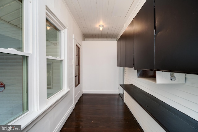 hall featuring dark hardwood / wood-style flooring and wood ceiling