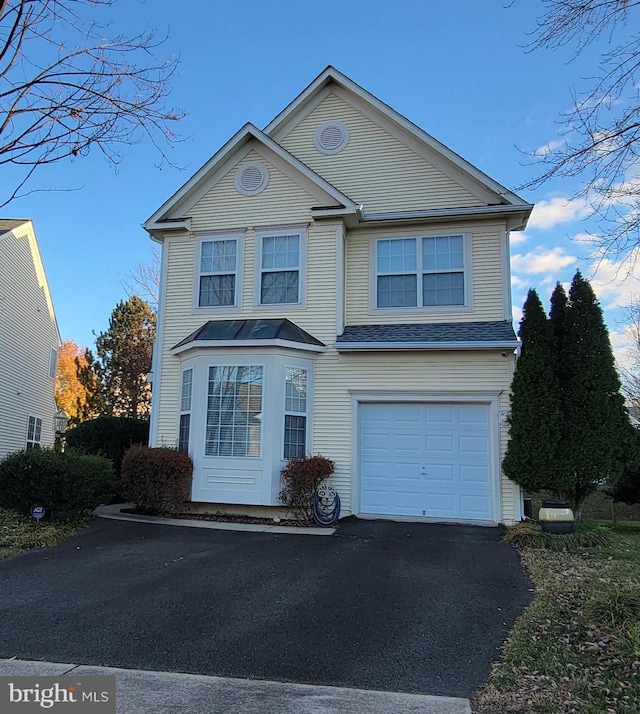 view of front property with a garage