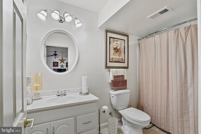 bathroom with vanity, a shower with curtain, tile patterned flooring, ceiling fan, and toilet