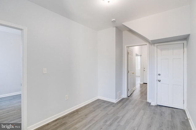 additional living space with light wood-type flooring