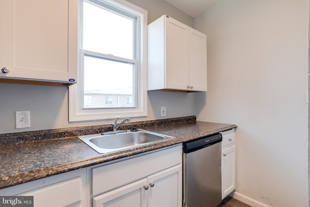 kitchen featuring white cabinetry, sink, and stainless steel dishwasher