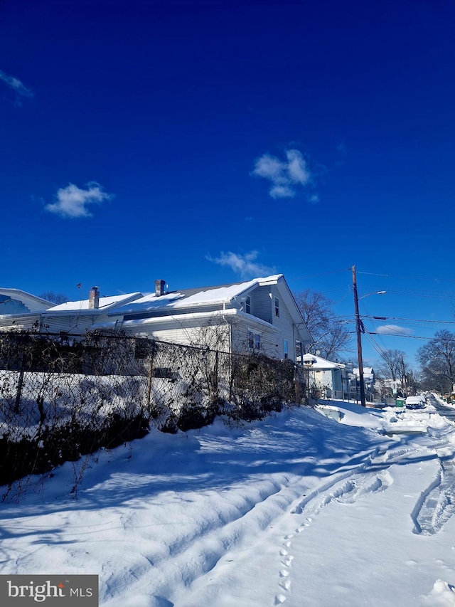 view of snow covered property