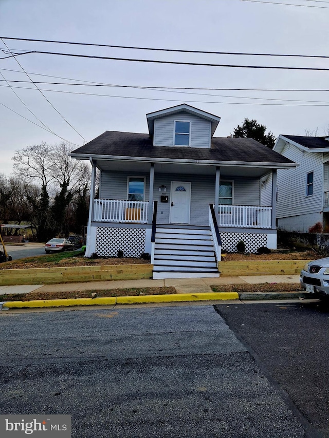 bungalow-style home with a porch