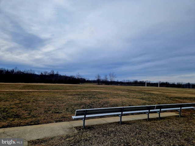 view of community with a rural view