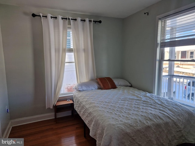 bedroom featuring dark hardwood / wood-style floors