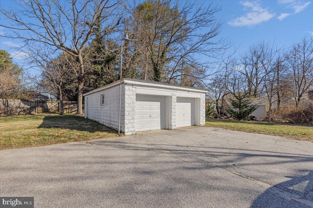 garage with a yard