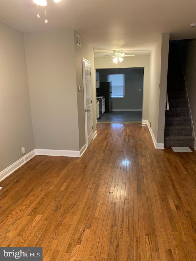 interior space with dark hardwood / wood-style flooring