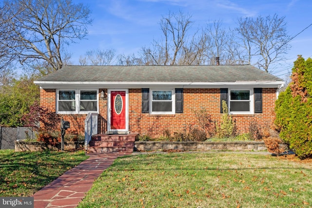 view of front of property with a front lawn