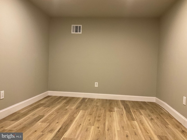 unfurnished room featuring light hardwood / wood-style flooring