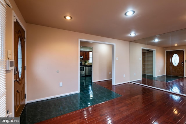 foyer entrance featuring dark hardwood / wood-style flooring