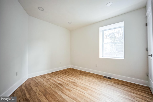 empty room with light wood-type flooring